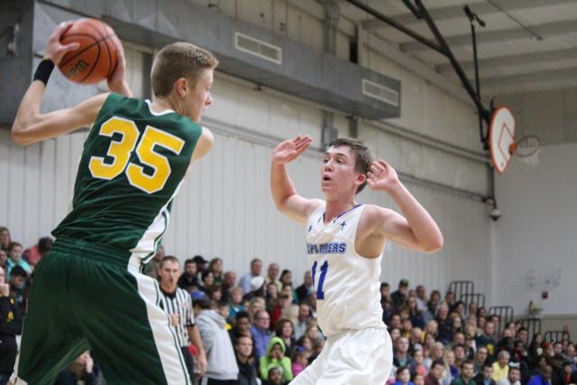 MELHS' No. 35 Noah Coddington moves to the basket. (Photo by Madelaine Gerard)
