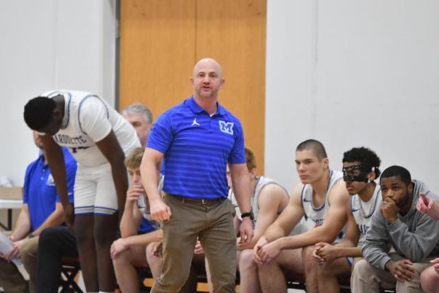 Steve Medford is back as head coach of the Marquette Explorers boys basketball team.