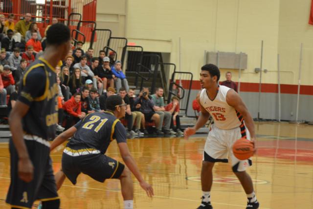 Edwardsville's Mark Smith handles the ball during the game against Belleville Althoff. (Photo by Dan Brannan)