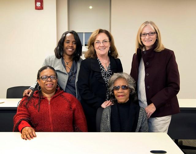 A group of Lincoln School alumni reminisce in a renovated classroom during Opening Night. Photos by Paige Allen, Lewis and Clark Community College photographer