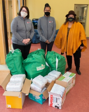 L-R) ECC Director Rebecca Dabbs MacLean, ECC Family Support Specialist Lealia Williams, and Norma McCandless, founder and executive director of The Metro East Diaper Bank.