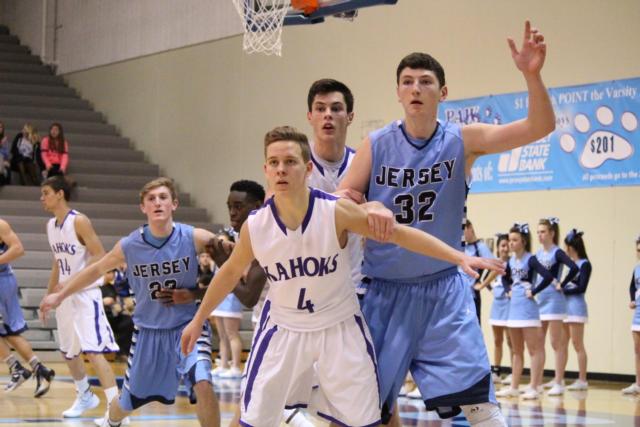 Tommy Maden holds back Drake Kanallakan. 