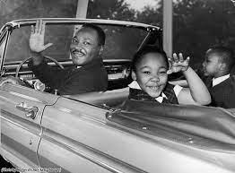 Martin Luther King Jr. waves with his children, Yolanda and Martin Luther III, from the 1964 World&rsquo;s Fair in New York City. Photo by Hulton Archive/Getty Images