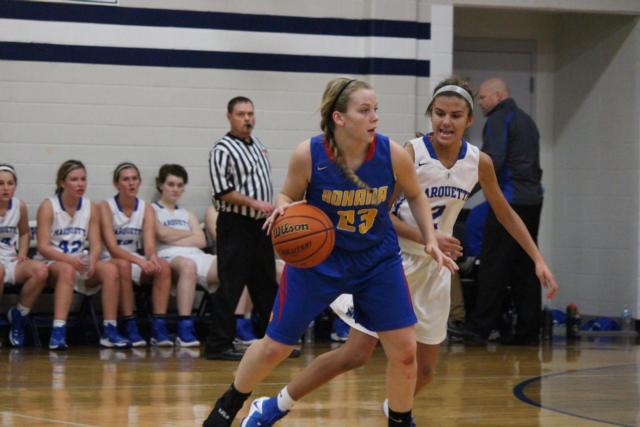 Abby Palen attempts to make her way around Taylor Aguirre.