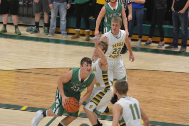 Carrollton's Jerrett Smith knocked in 10 points for the Hawks against Southwestern, but was all over the boards and tight on defense in Carrollton's victory Tuesday night. (Photo by Dan Brannan)