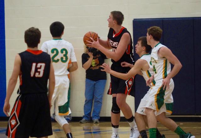 Ben Bayless collects a pass and goes up for a close-range shot.