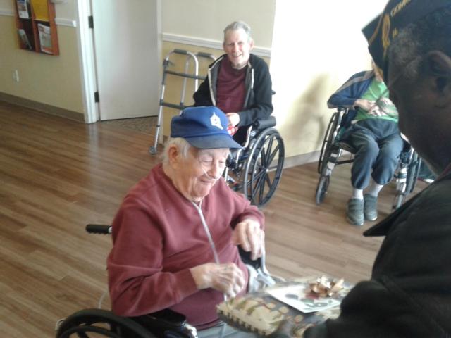 Eldon Smith receives gift from Brice