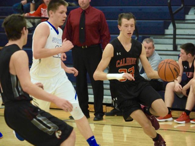 Corey Nelson driving by Josh Hopper.