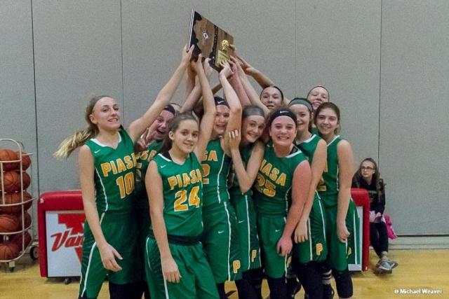 The future looks bright for Southwestern basketball with these talented girls. The girls display their sectional plaque after trampling Pana. The team plays Saturday at the IESA State Girls Basketball quarterfinals. (All photos courtesy of Michael Weaver)