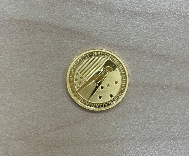 A gold coin given to the Salvation Army last year.