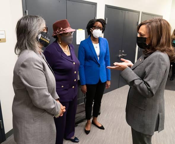 Pictured: Rep. Robin Kelly (D-IL), Rep. Alma Adams (D-NC), and Rep. Lauren Underwood, (D-IL) talking to Vice President Kamala Harris at the first-ever White House Maternal Health Day of Action.