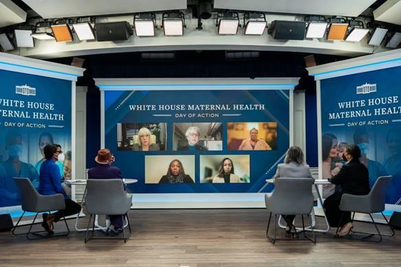 Pictured on stage left to right: Rep. Lauren Underwood (D-IL), Rep. Alma Adams (D-NC), Rep. Robin Kelly (D-IL), CMS Administrator Chiquita Brooks LaSure. Pictured on-screen left to right, top row: Senator Patty Murray (D-WA), Dr. Ann Newman of North Carolina, Ms. Anntoinette Brown of Illinois; bottom row: Nurse Karie Stewart of Illinois and Washington State Senator T’wina Nobels.