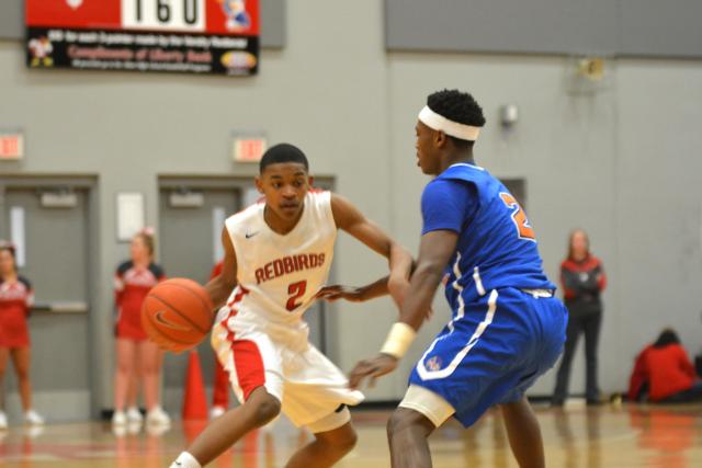 Alton's Ty’ohn Trimble had 9 points in the game against East St. Louis. (Photo by Dan Brannan)