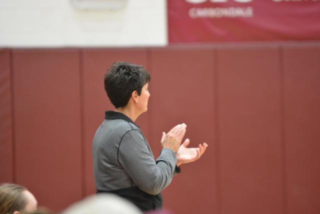 Coach Lori Blade encourages her Edwardsville girls on Thursday night.