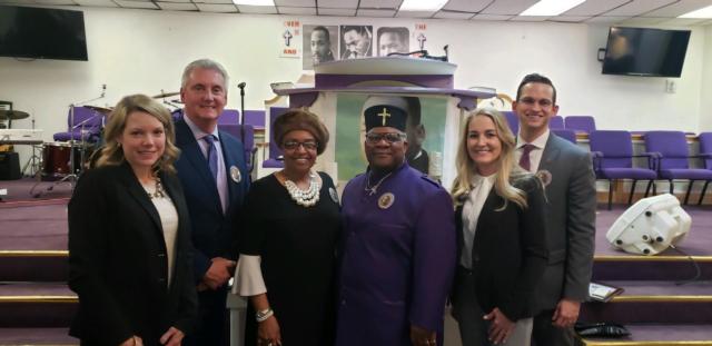 New Shining Light Outreach Ministry Bishop John Williams stands with County Board members (left to right) Erica Harris of Glen Carbon, Tom McRae of Bethalto, Gussie Glasper of Venice, Chrissy Dutton of Bethalto and David Michael of Highland. Harris, McRae and Dutton received the Humanitarian Award during the 23rd annual Rev. Martin Luther King Jr. Birthday Observance.