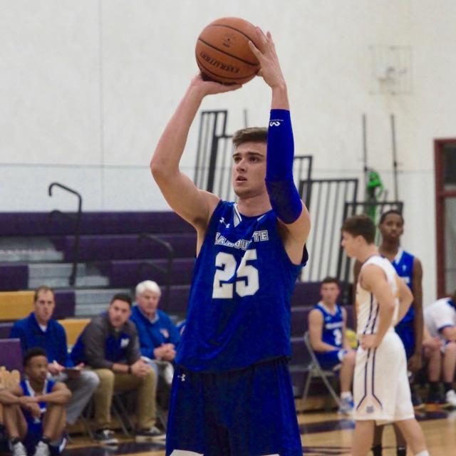 Jake Hall attempting a free-throw after an intentional foul was called on Mount Olive.