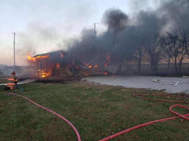 The oversized garage in Holiday Shores was blazing early this morning when firefighters arrived.