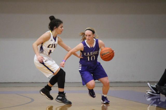 Kourtland Tyus defends against Andrea Frerker