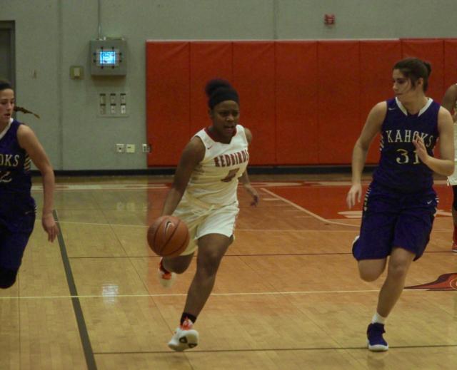 A'llurah Bowens-Robinson dribbles in transition.