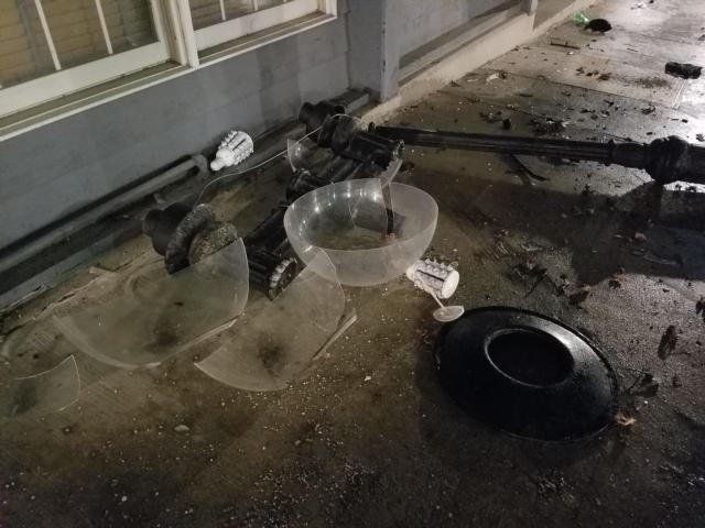 This is what is left over of the lamp post after the car struck it. (Photo John Hentrich)