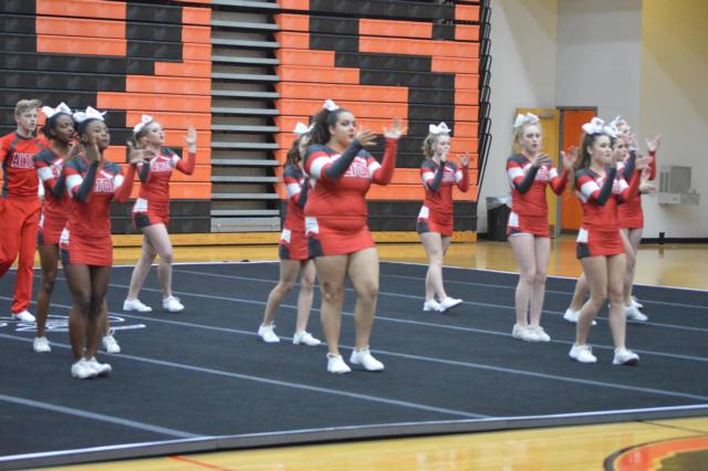 Alton High cheerleaders in action. (Photo by Brent Feeney)