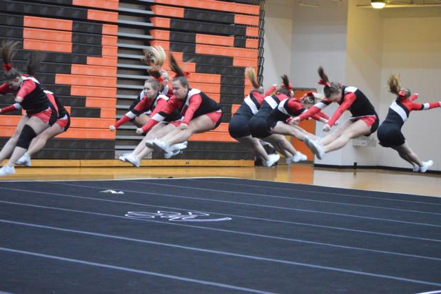 Bunker Hill girls in a stunt during the competition. (Photo by Brent Feeney)