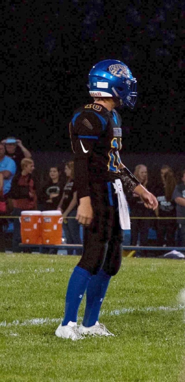 Crane looking to the sidelines for a play call.