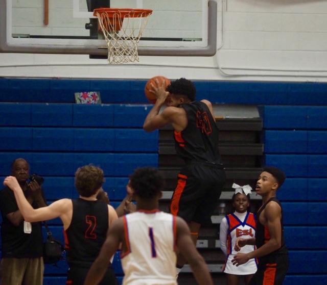 RJ Wilson hauls in a rebound.