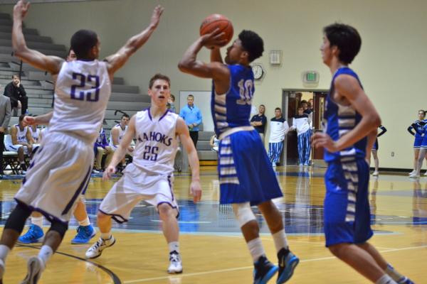 Shandon Boone pulls up for a shot against Collinville on Tuesday.