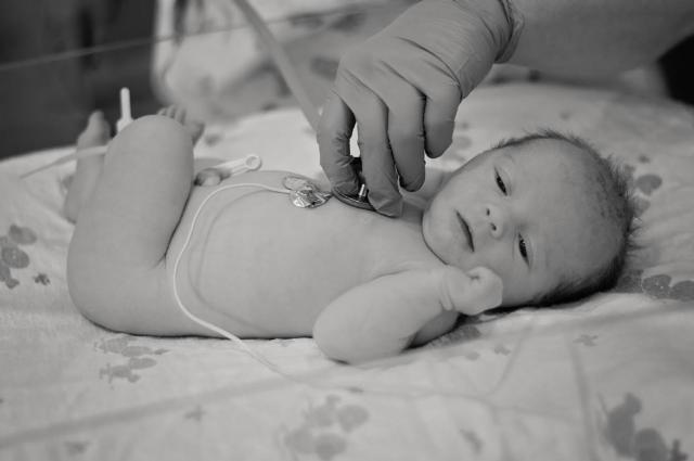Ella June Rheude is checked out by staff at the Women's Pavilion at OSF Saint Anthony's Health Center.