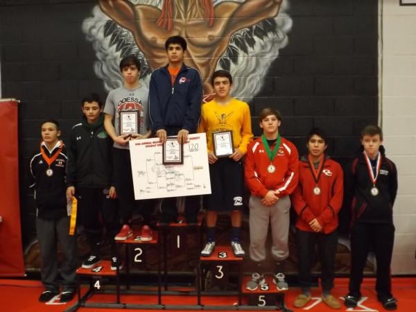 Connor Broyles of Alton is shown on the medal stand at the Granite City Tourney.