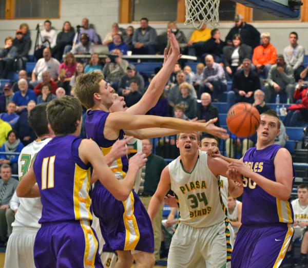 A host of players go for a loose ball during Monday night's Southwestern-Civic Memorial basketball game in the Freeburg Tourney. Southwestern won 53-49 to advance to Tuesday night's championship game against Columbia.