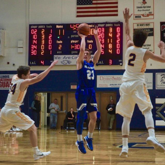 Regan Snider attempts a three-pointer.