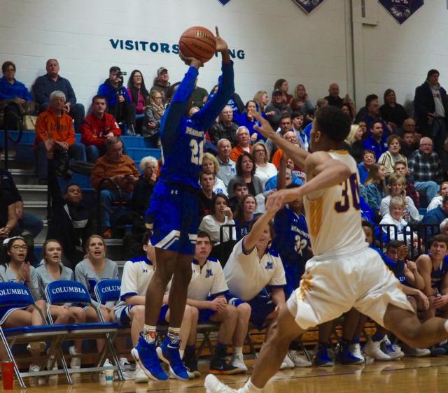 Ervin shooting the three-pointer that gave Marquette all the momentum.