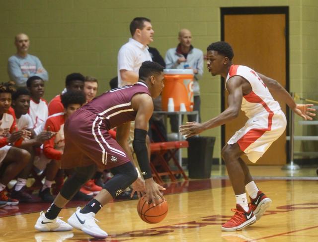 Caldwell guarding Malachi Smith.