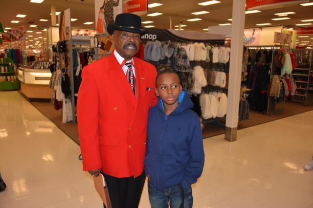 James Gray had a huge impact on youth in the region. He is shown at one of his shopping sprees for Christmas at Target. (Photo by Dan Brannan)