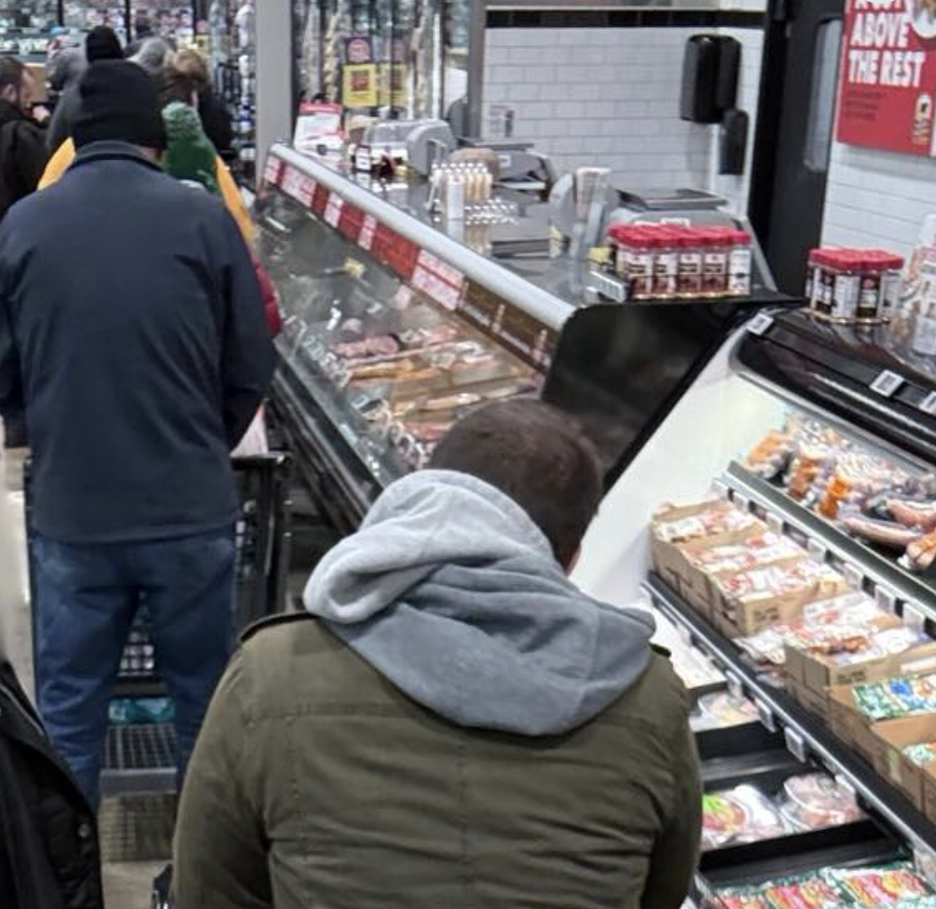 Photo by Justin Hawkins on Friday morning of many shoppers out obtaining goods for the weekend predicted with bad weather.