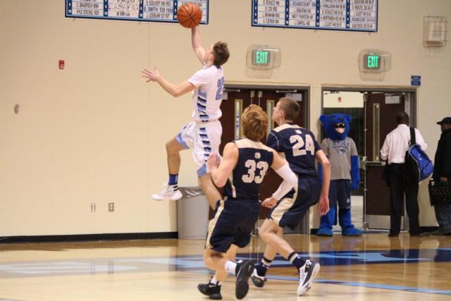Zac Ridenhour knocking in a basket. 