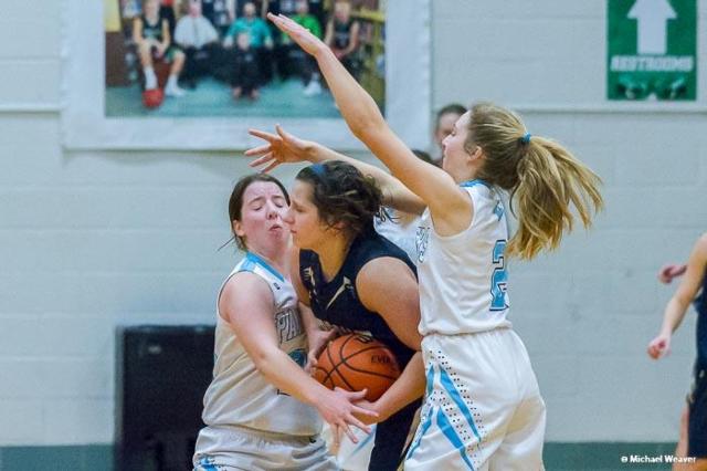 Jersey applies tight defense against Quincy Notre Dame in the Lady Hawk Invitational. (Photos courtesy of Michael Weaver)
