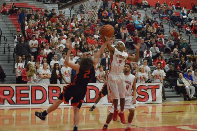 Shown is a battle of Edwardsville and Alton's No. 2 players going for the ball. No. 2 for Alton is Ty'ohn Trimble; No. 2 for Edwardsville is Jack Marinko. (Photo by Brent Feeney)