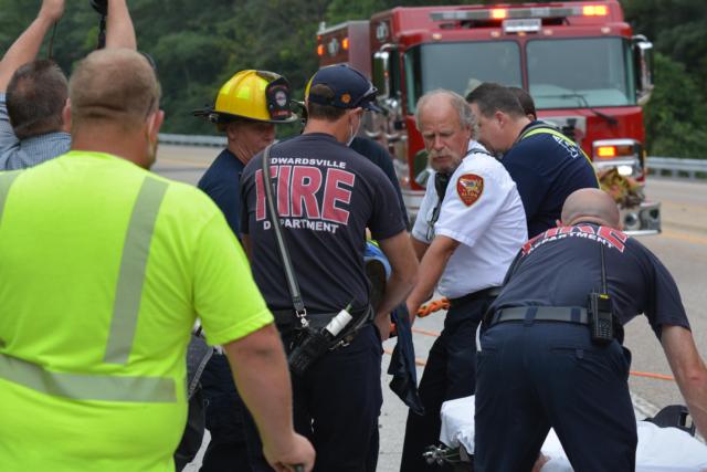 Brad Sweetman on one of his last days as a firefighter in a rescue situation at 20th Street and Martin Luther King Boulevard in Alton. (Photo by Dan Brannan)