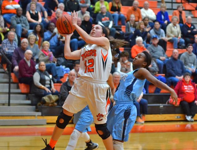 Edwardsville's Makenzie Silvey moves in for two points against Belleville East.