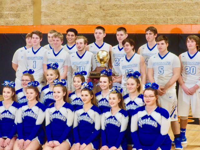 The North Greene Spartans pose for photos after winning the Beardstown Tournament championship.
