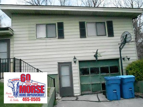 BEFORE: Morse Home Improvement removed and replaced all of the old roofing, aluminum siding, shutters, front storm door and garage door on this project.