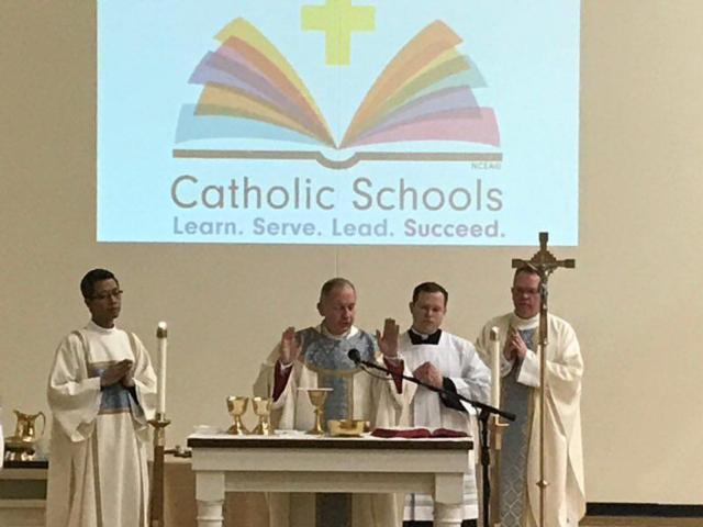 Bishop Thomas John Paprocki celebrates Mass during Catholic Schools Week at Father McGivney Catholic High School