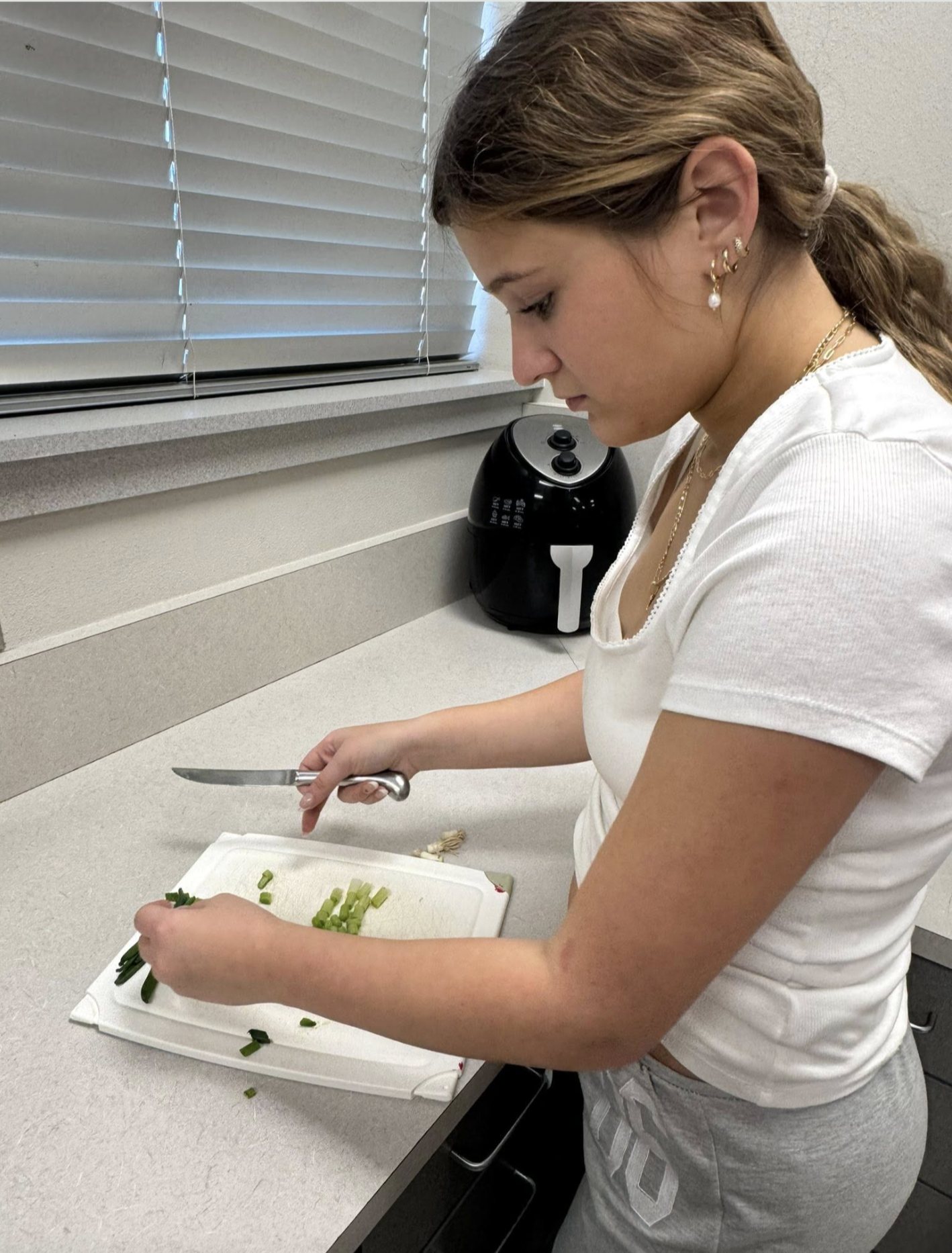 Students involved in Alton FCCLA class activities in these two photos.