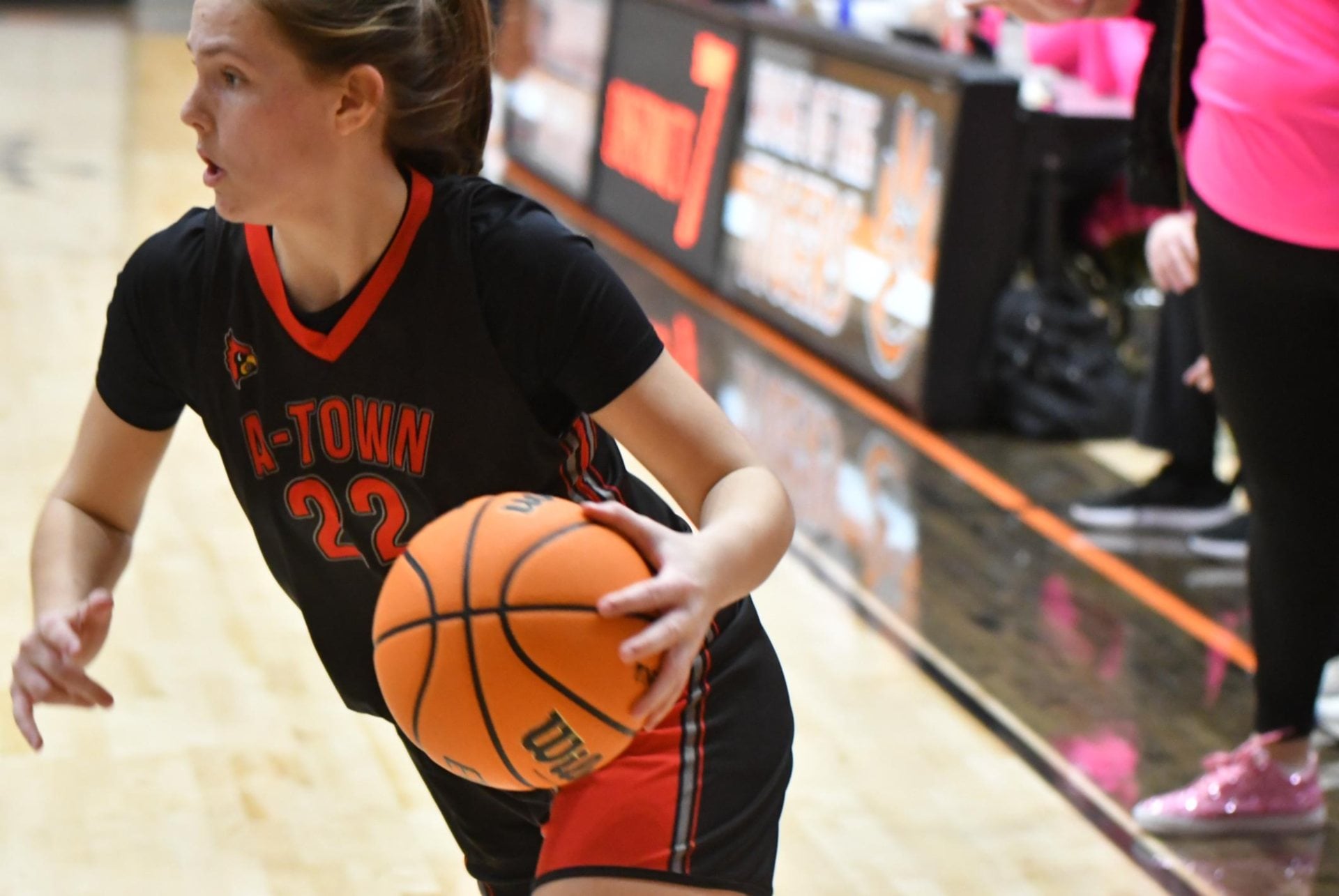 Standout Redbirds girls basketball player Madeline Ducey moves in for a basket on Thursday against Edwardsville. (Photo by Dan Brannan).