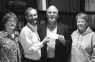  Pictured from left to right - Carole Pohlman (wife of Jim Pohlman), Dr. Joel Perlmutter (chairman of Parkinson’s Disease Research at Washington University), Phil Pohlman & Jan Pohlman (siblings of Jim Pohlman)