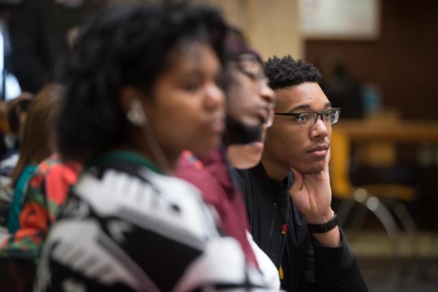 Belleville native Nick Givens, a sophomore studying psychology, listens intently to the featured presentations during the Black Heritage Month kickoff celebration at SIUE.