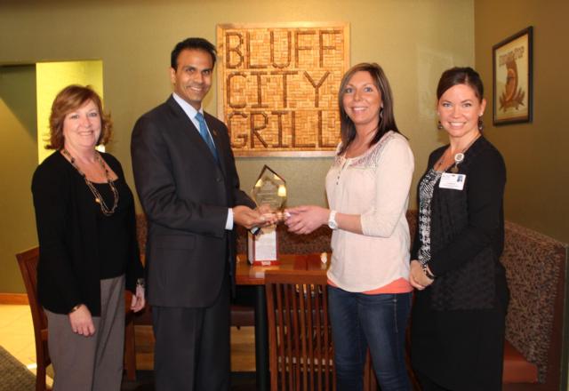 Bluff City Grill Owner Cathy Gross is presented the Business Health Award from OSF Saint Anthony’s President Ajay Pathak and Annual Fund Coordinator Lee McRaven, and RiverBend Growth Association President Monica Bristow. For more information on the Business Health Award, call OSF Saint Anthony’s Foundation at 618-463-5168.